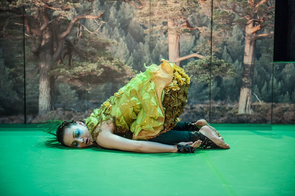 Dancer Jade Adamson performing as Poggle for Barrowland Ballet in textured costume designed by Alison Brown Costume Designer.